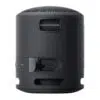 A black Sony SRS-XB13 wireless speaker in a high-resolution close-up, highlighting its textured surface and bold black color.