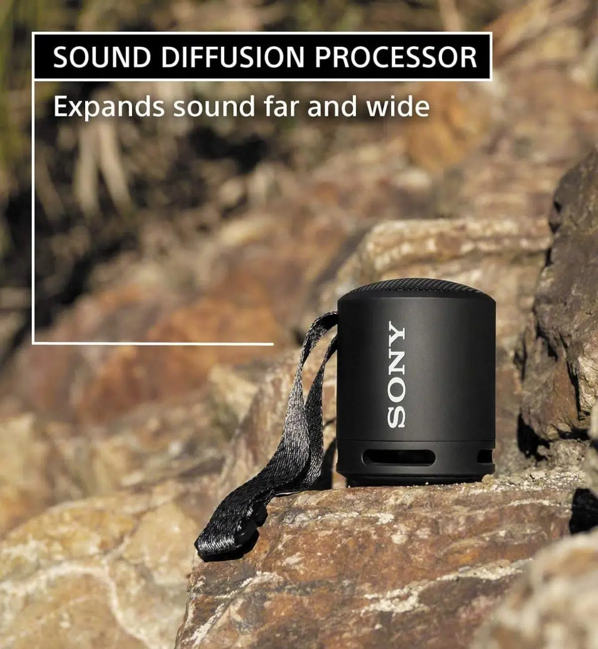 Close-up view of the front of a black Sony SRS-XB13 wireless speaker, emphasizing the speaker grille and the Sony logo.